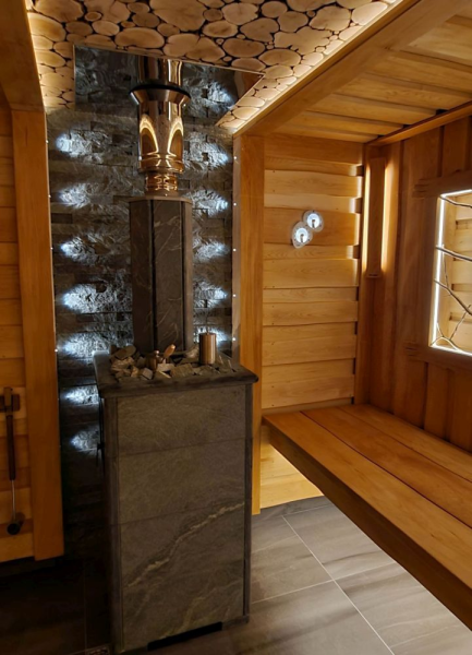 Фото Печь для русской бани Геленджик М2 в трёхстороннем кожухе (талькохлорит) с открытым верхом в магазине Woodson Фото Печь для русской бани Геленджик М2 в трёхстороннем кожухе (талькохлорит) с открытым верхом в магазине Woodson